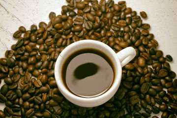black coffee beans on white background and effect retro vintage