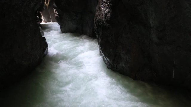 Rapids in Partnach Gorge or Partnachklamm is a scenic location and nature attraction in Germany near Garmisch Paterkirchen.