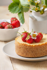 Cheesecake with strawberries on a plate