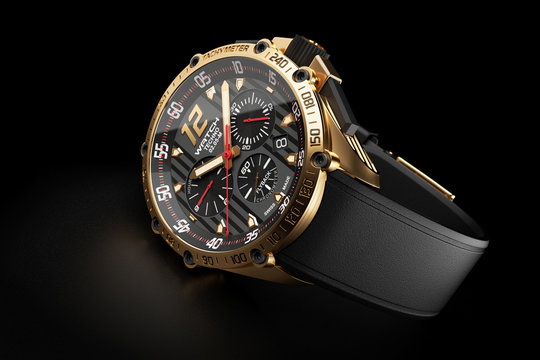 Golden luxury wristwatch with black clock face on black backgrou