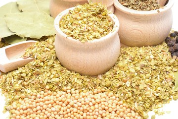 spices and herbs isolated on white background, oregano, basil, pepper, sage,bay leaf