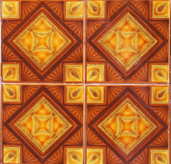 Detail of the traditional tiles from facade of old house in Valencia, Spain