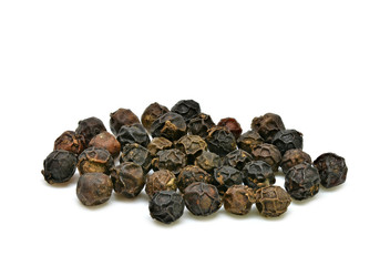 Black pepper corns on white background