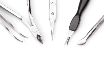 Tools of a manicure set on white background