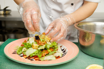 Obraz na płótnie Canvas Chef is cooking appetizer