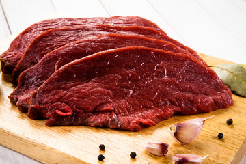 Fresh raw beef on cutting board 