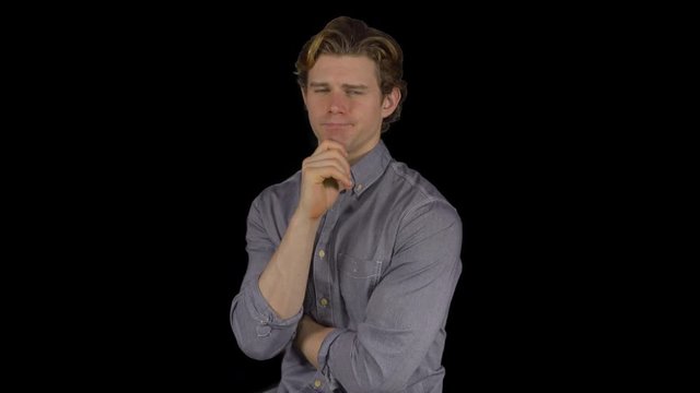 Man looks at camera quizzically (Transparent Background)