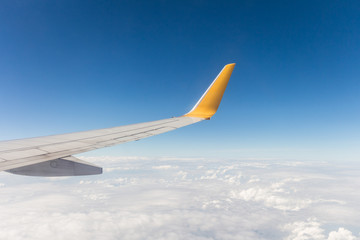 Obraz premium View from a window seat in cabin of the aircraft.