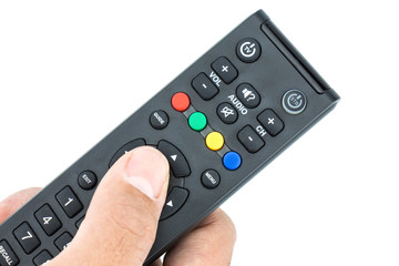 Hand held with remote control pointing forward on white backgrou