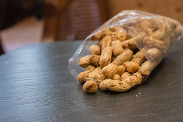 Pile of peanut on black stone table