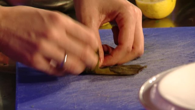 Chef preparing Vine Leaf Rolls