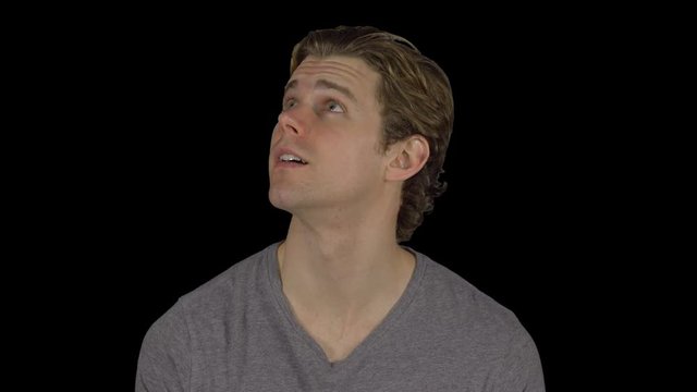 Guy looks at choices over his head (Transparent Background)