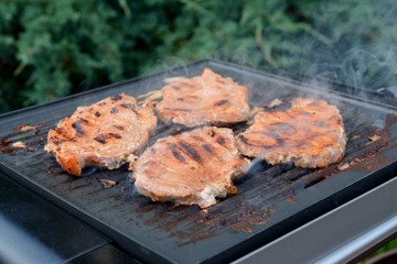 Porkneck fried on electric grill.