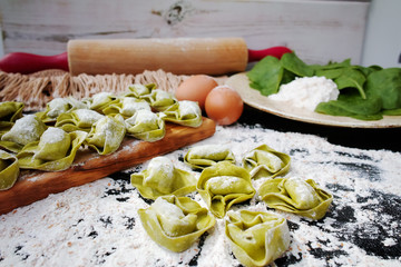 Homemade green pasta ravioli with spinach and ricotta cheese