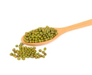 a bunch of mung beans on wooden spoon isolated on white backgrou