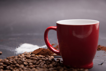 red cup with coffee beans