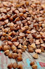 Many buckwheat groats on table