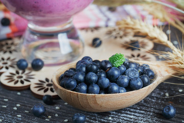 Delicious bilberry smoothie, detox yogurt or milkshake with fres