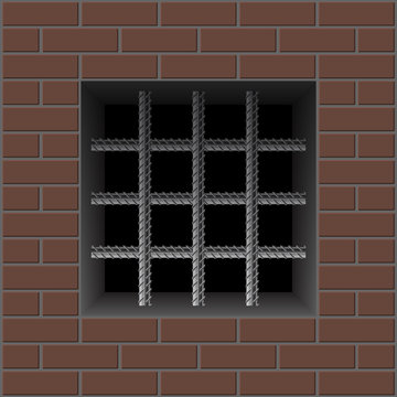 Prison brick wall and window with iron bars reinforced. 
