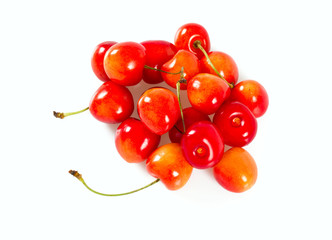 yellow and pink cherries isolated on white