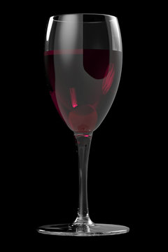 Wineglass of red wine closeup on dark background 