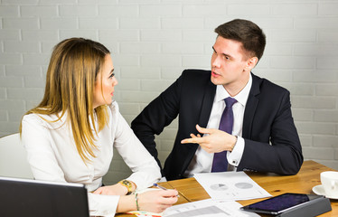 business couple working together on project at modern startup office