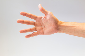 Closeup of the human hand on gray background-2