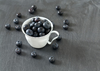 blueberries on stone board