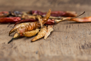 Closeup of the dried chili on the wood