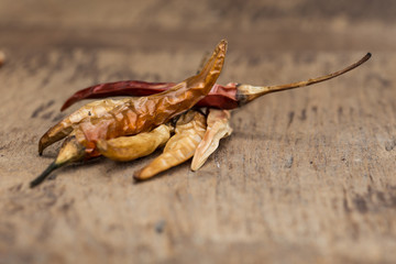 Closeup of the dried chili on the wood
