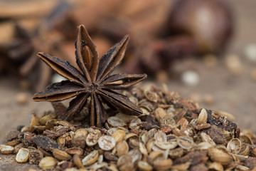 Spices lying on a wooden surface closeup