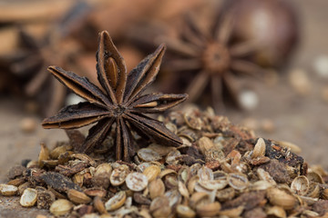 Spices lying on a wooden surface closeup