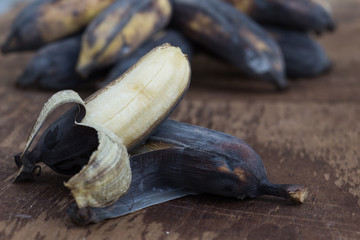 Old banana on a wooden table