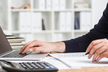 Businessman doing his accounting