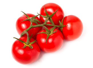 branch five tomatoes isolated on white background