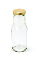 Empty glass packaging bottle isolated on white background