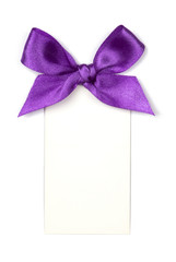 Purple ribbon with bow and card