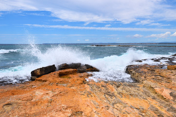 Turbulent wavy sea hitting the coast of the Majorca island