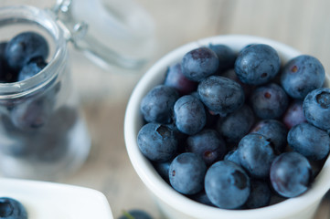 blueberries yogurt on old wooden vintage floor