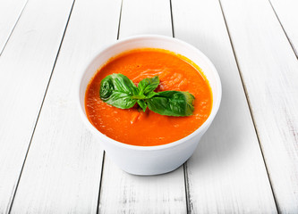 Hot food delivery - tomato gazpacho soup isolated