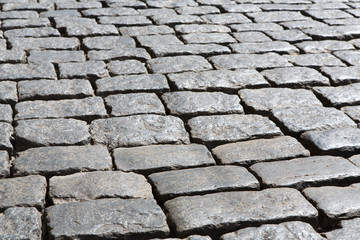 Stone paving texture. Abstract old pavement background.