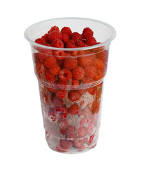 A plastic disposable cup with a raspberry.