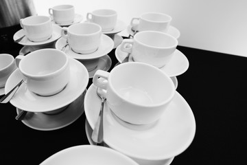 White tea cups compiled stack.