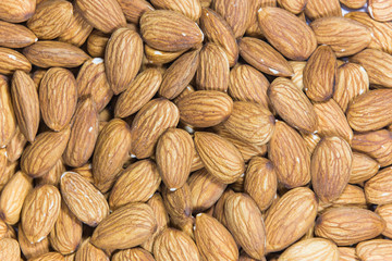 A lot of almonds laying on the table