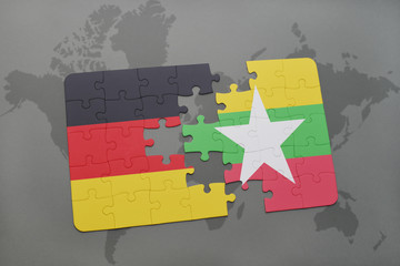 puzzle with the national flag of germany and myanmar on a world map background.