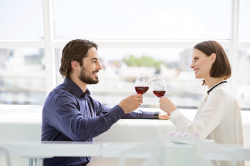 Happy man and woman celebrating event