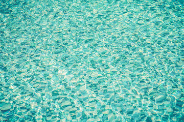 Swimming pool water. Aqua texture (Vintage filter effect used)