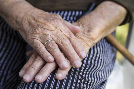 Close-up of old womans hands
