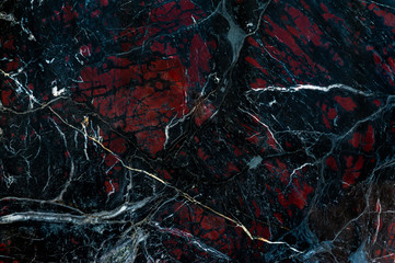Black onyx with red spots texture