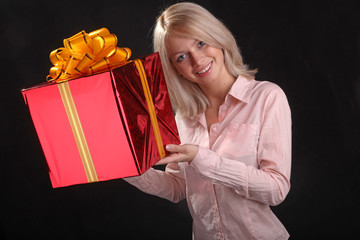 blonde with a gift in the hands